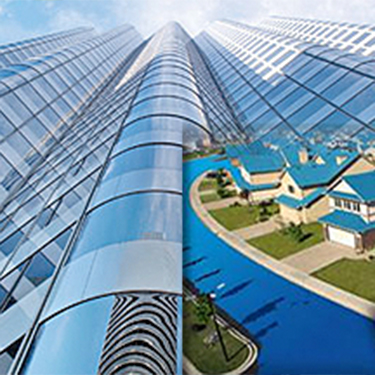 Exterior of a skyscraper and homes with blue cool roofs. Exterior of a skyscraper and homes with blue cool roofs.